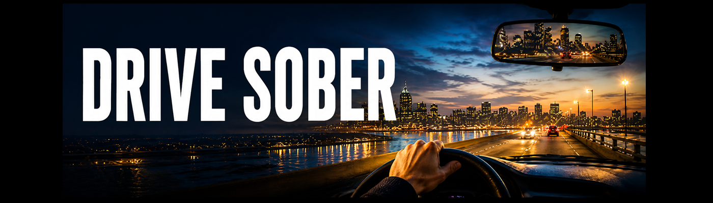 Billboard of a man driving with one hand on the wheel, and the text 'Drive sober'